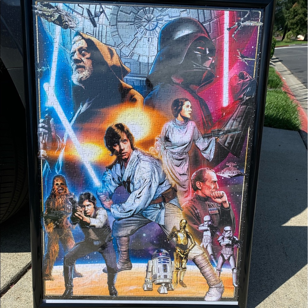 28x20 framed Star Wars 1000 piece puzzle poster.